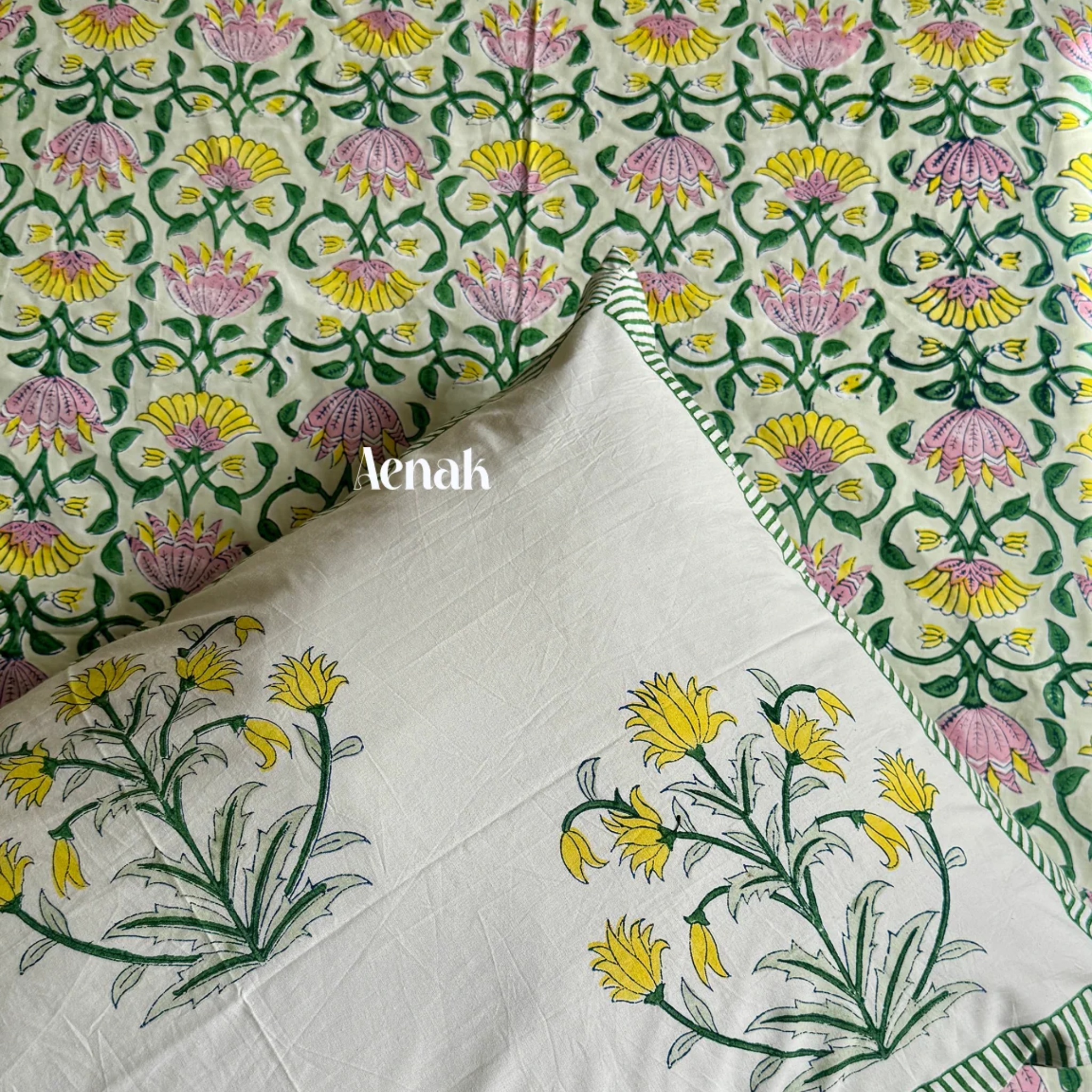 Pink & Yellow Lotus Handblock Bedsheet + Quilted Bedcover Combo Set by Aenak Studios | Tooffi