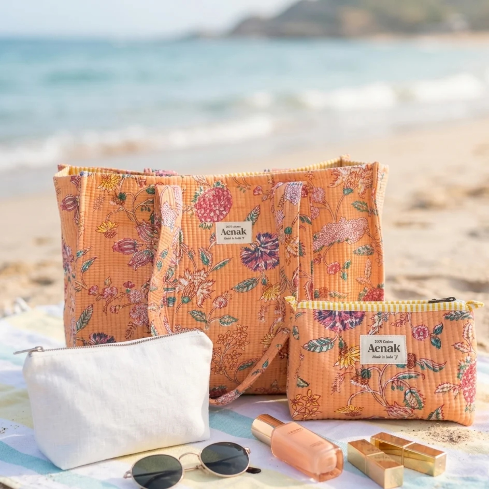 Orange Floral Garden Quilted Cotton Travel Bag + Vanity Pouch by Aenak Studios | Tooffi