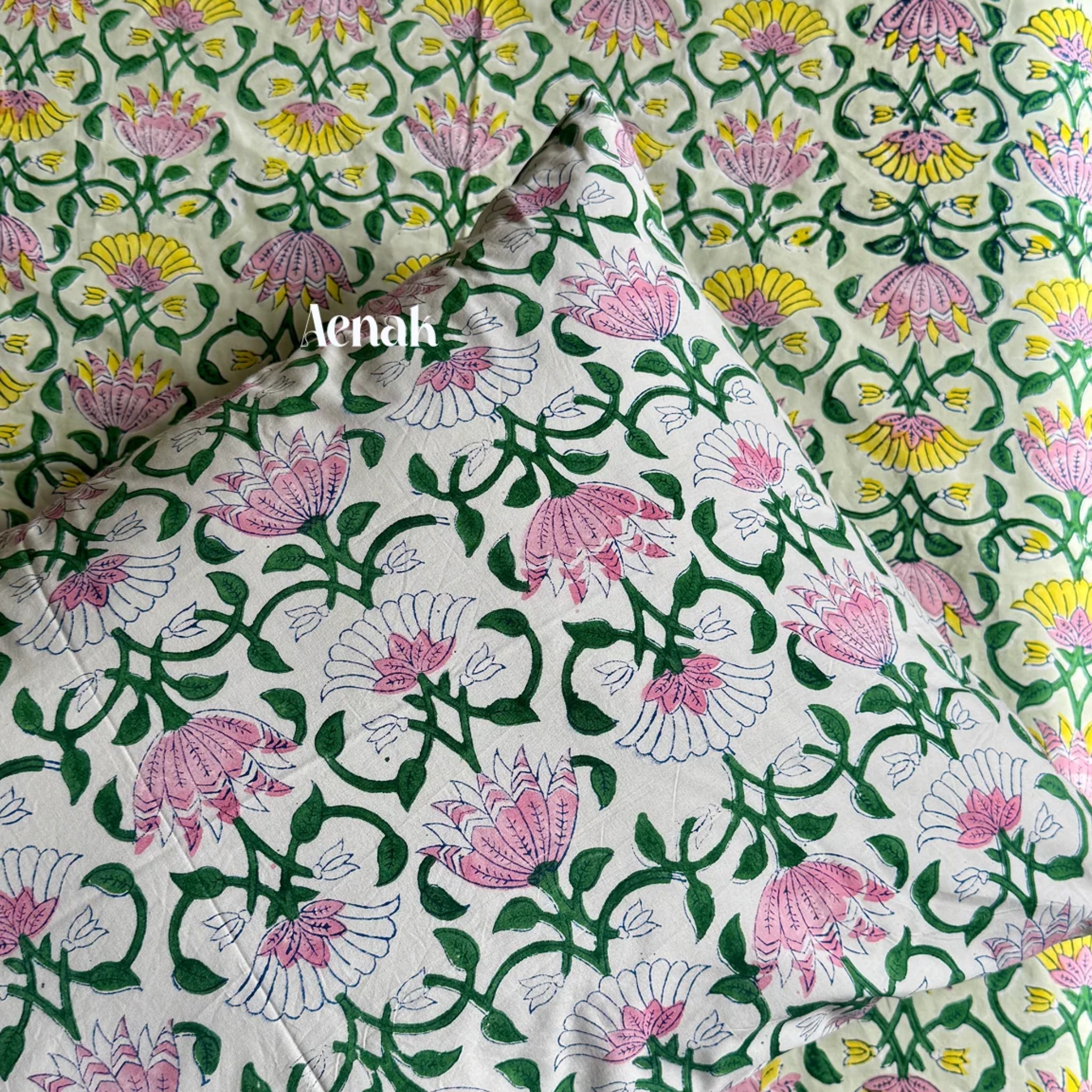 Pink & Yellow Lotus Handblock Bedsheet + Quilted Bedcover Combo Set by Aenak Studios | Tooffi