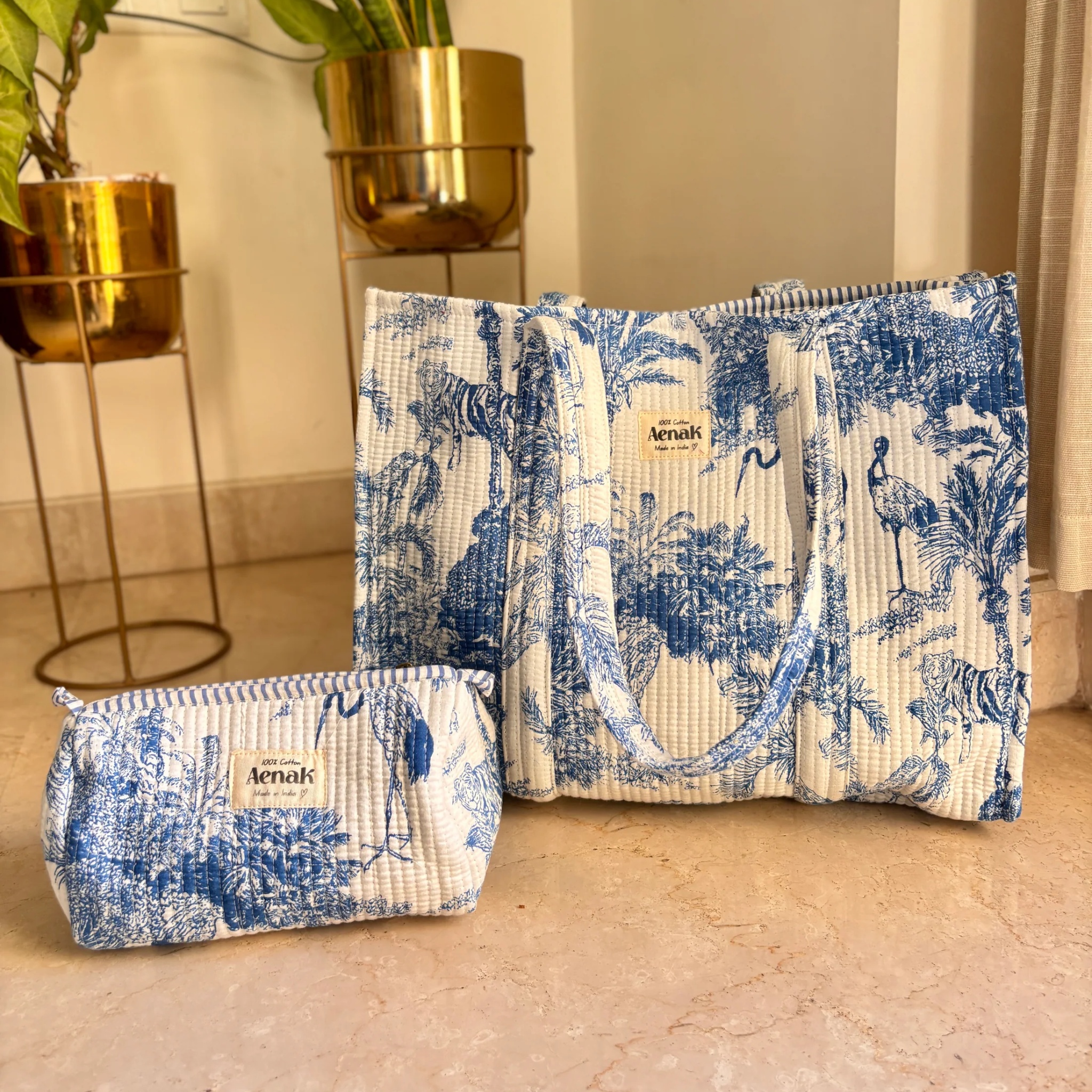 Blue Jungle Quilted Cotton Travel Bag + Vanity Pouch by Aenak Studios | Tooffi