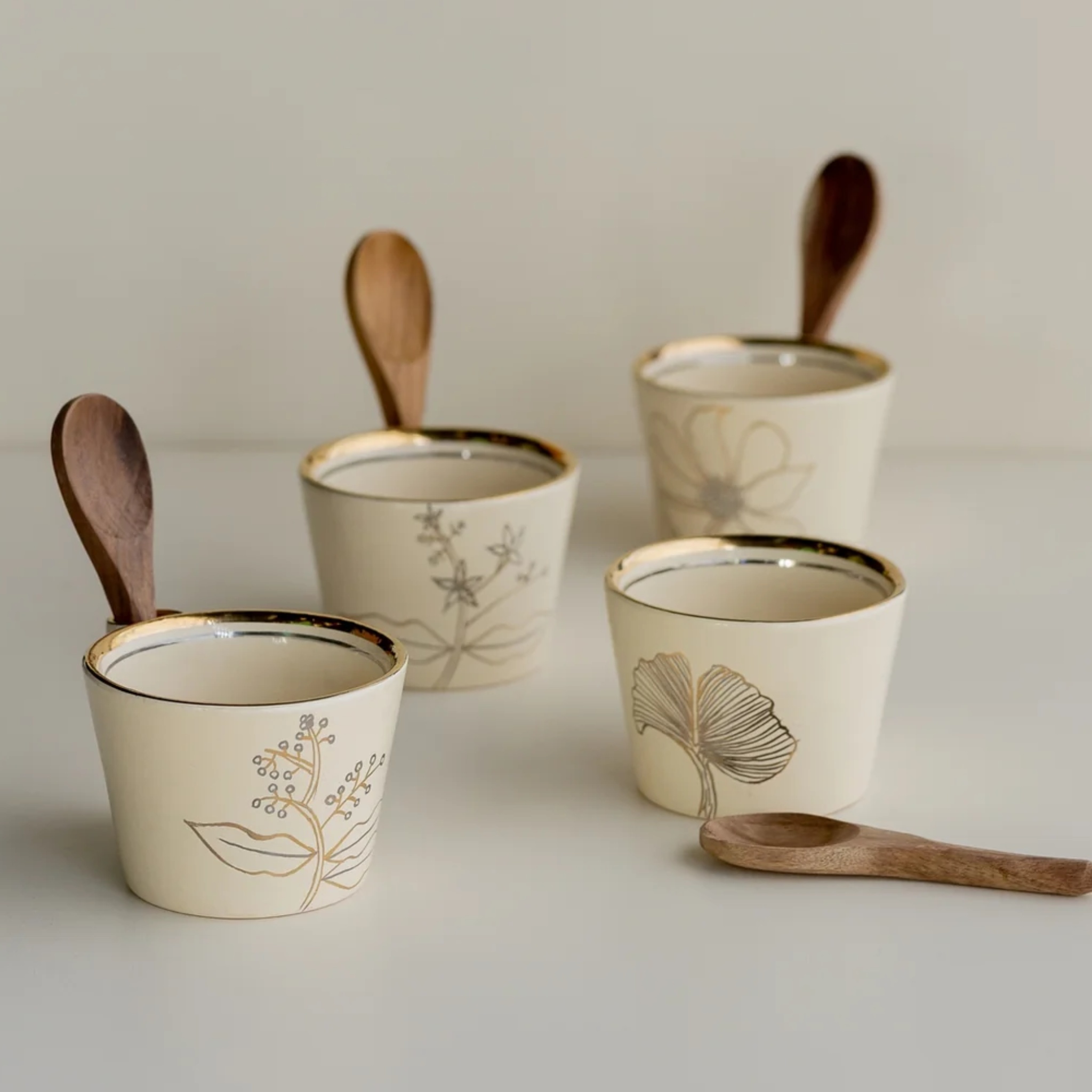 Wildflower Ivory Bowl with wooden spoons (Set Of 4) by nira's ceramics | Tooffi