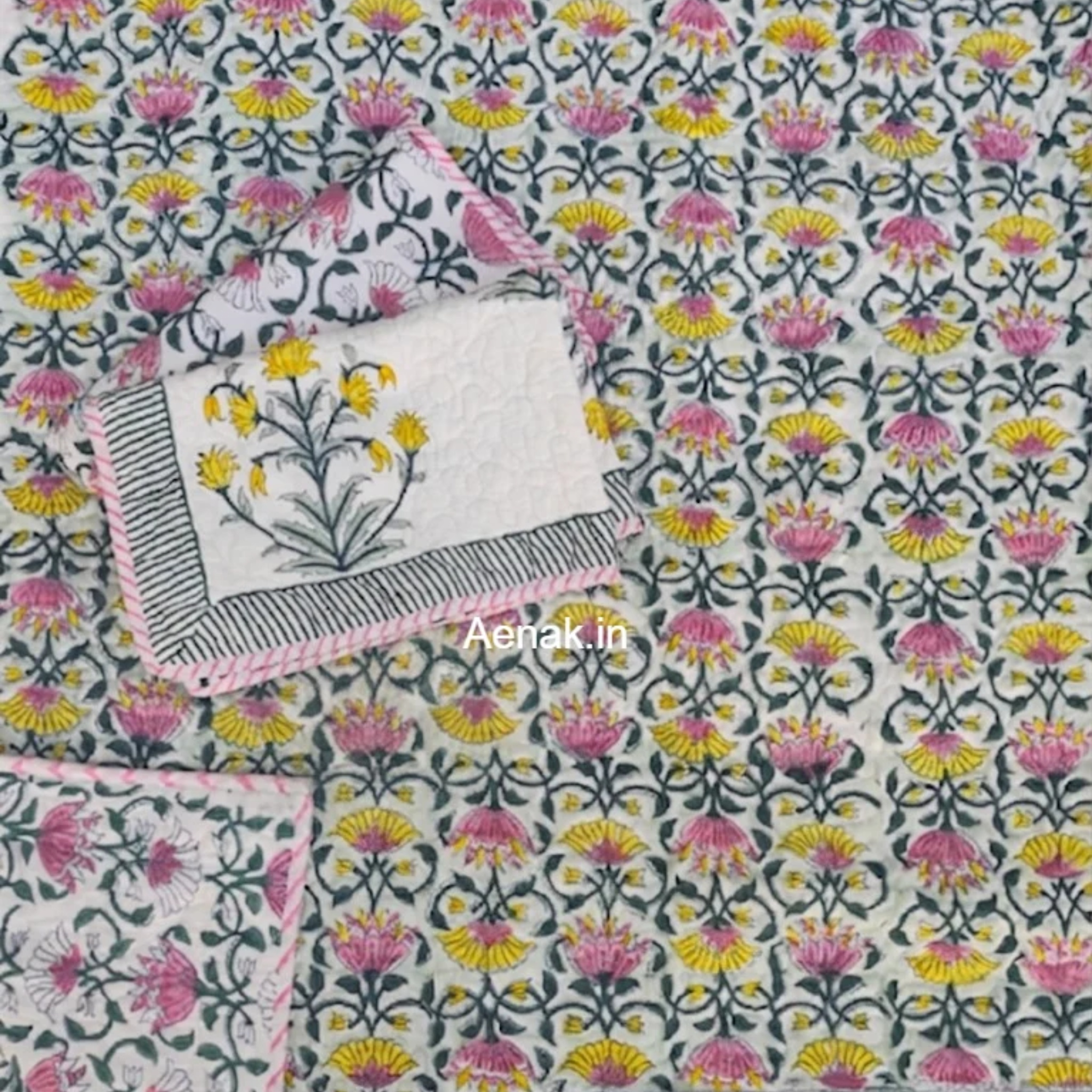 Pink & Yellow Lotus Handblock Bedsheet + Quilted Bedcover Combo Set by Aenak Studios | Tooffi