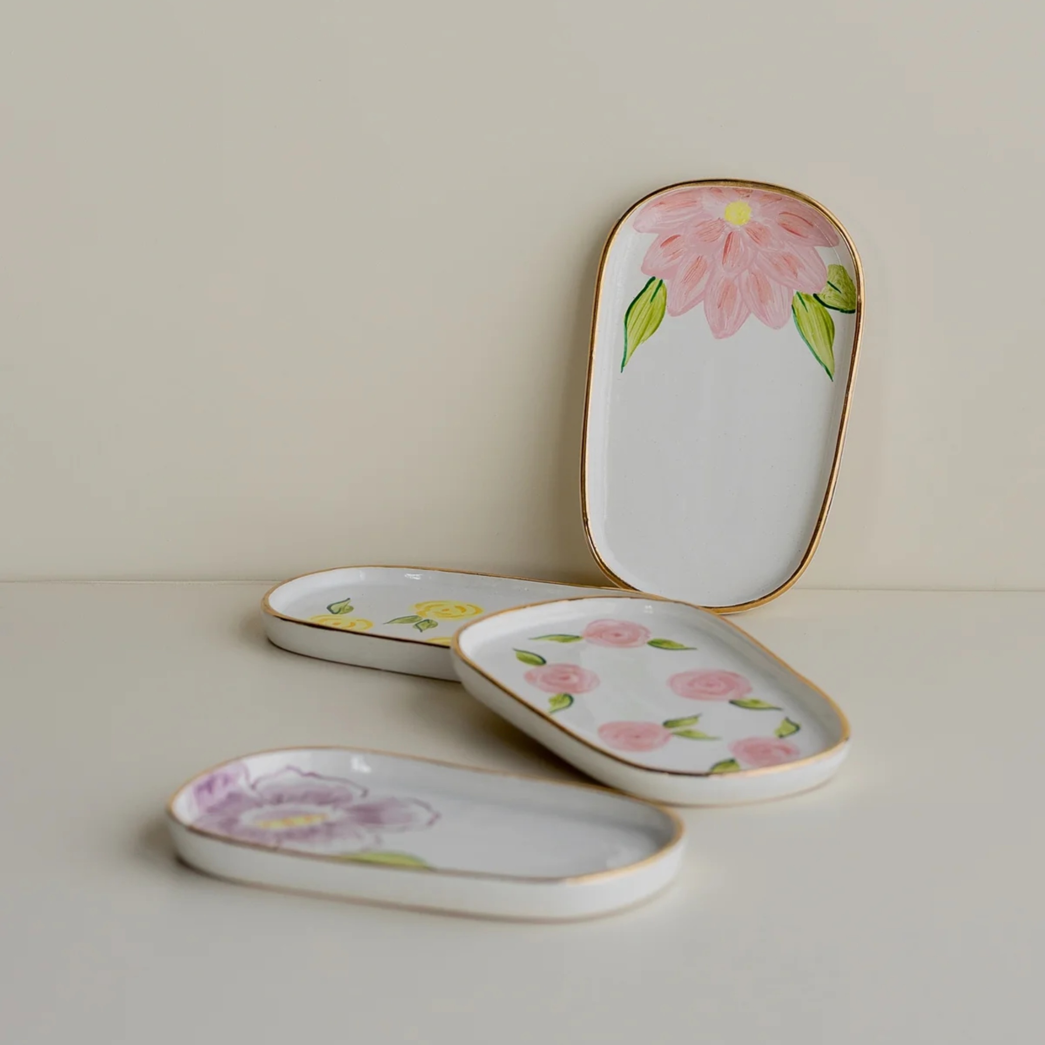 pink lilies oval plates (set of 4) by nira's ceramics | Tooffi
