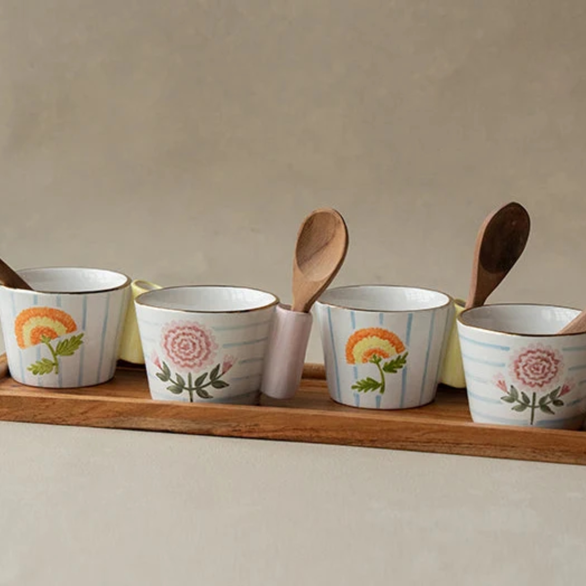 Mira Bowl with wooden spoons (Set Of 4) by nira's ceramics | Tooffi