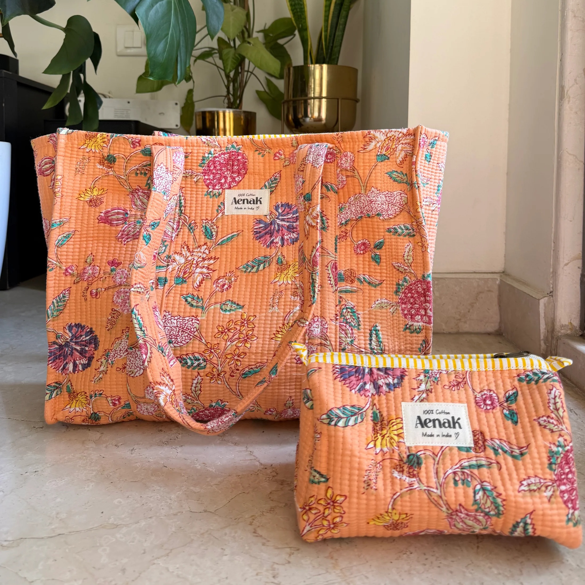 Orange Floral Garden Quilted Cotton Travel Bag + Vanity Pouch by Aenak Studios | Tooffi