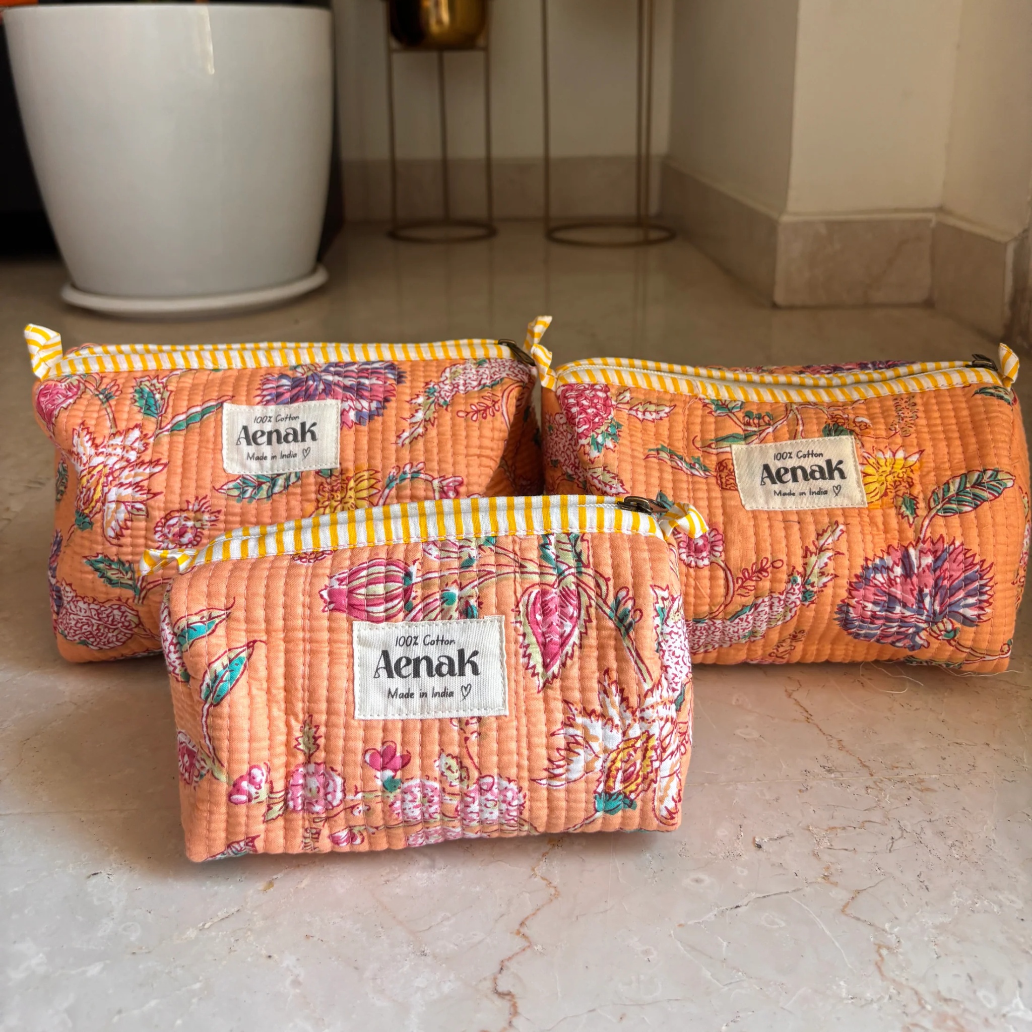 Orange Floral Garden Quilted Vanity Pouches-Set of 3 by Aenak Studios | Tooffi