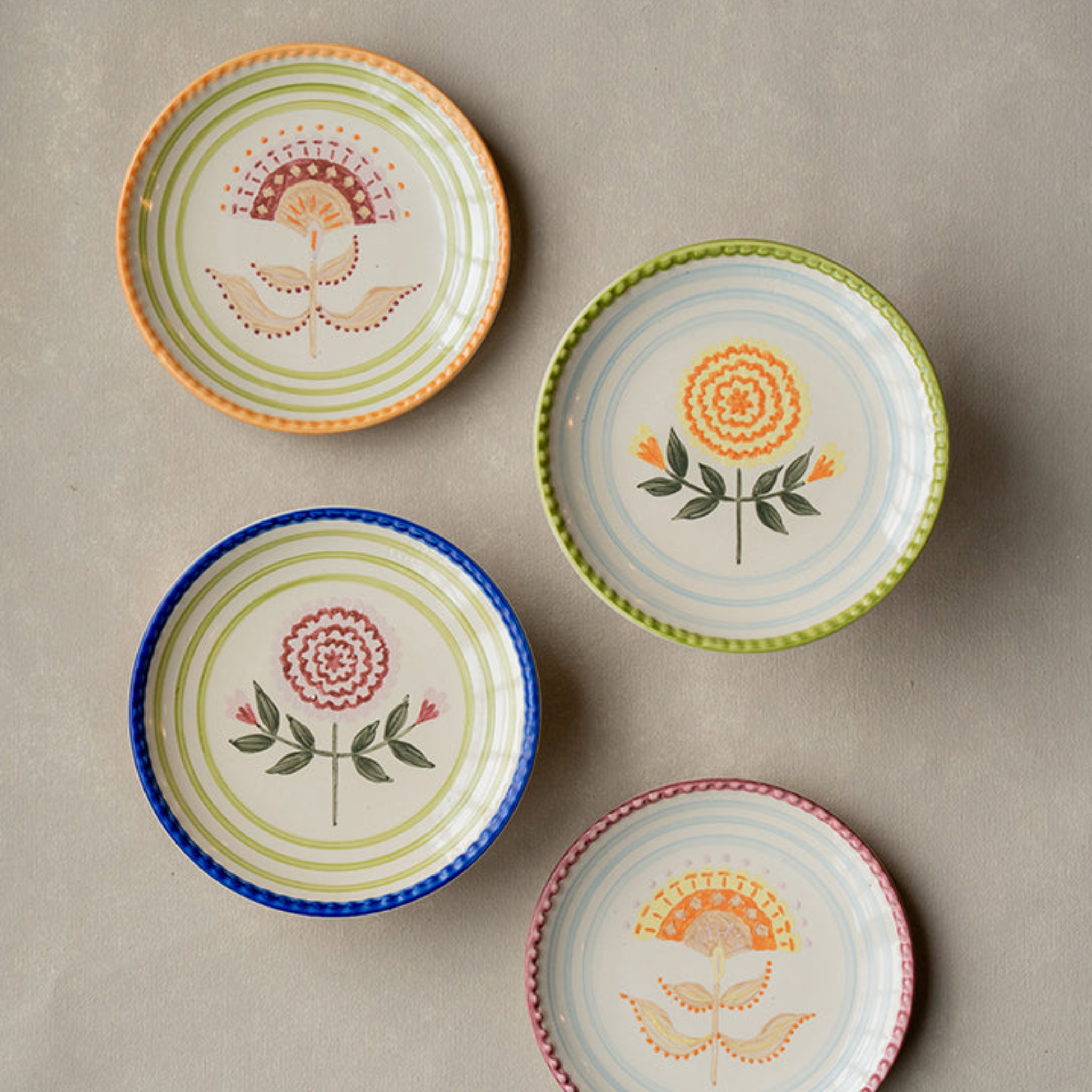 Mira Appetizer plates ( set of 4) by nira's ceramics | Tooffi