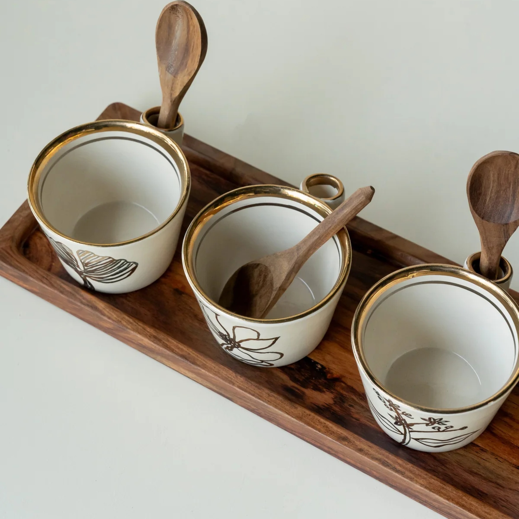 Wildflower Ivory Bowl with wooden spoons (Set Of 4) by nira's ceramics | Tooffi