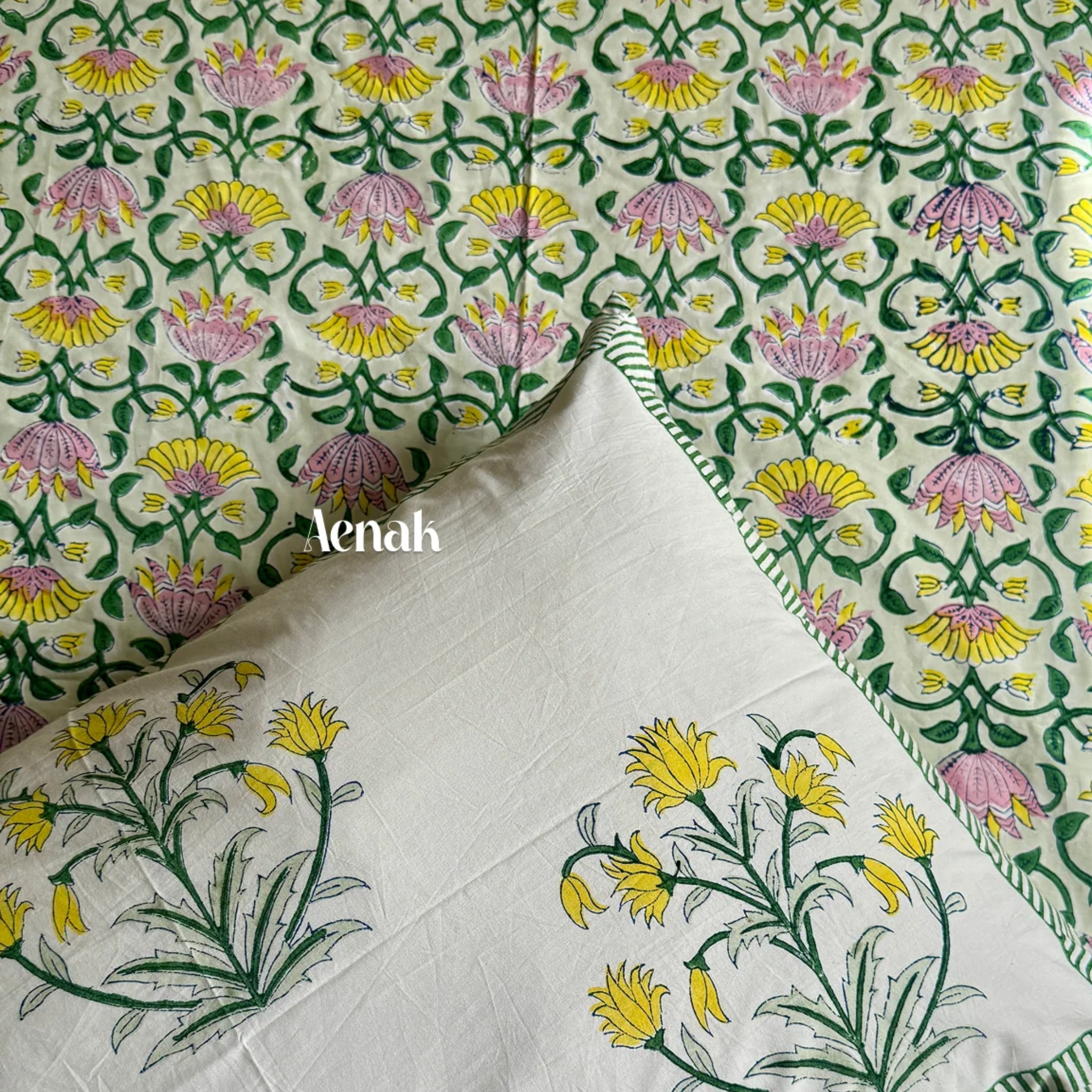 Pink & Yellow Lotus Handblock Printed Premium Cotton Bedsheet Set by Aenak Studios | Tooffi