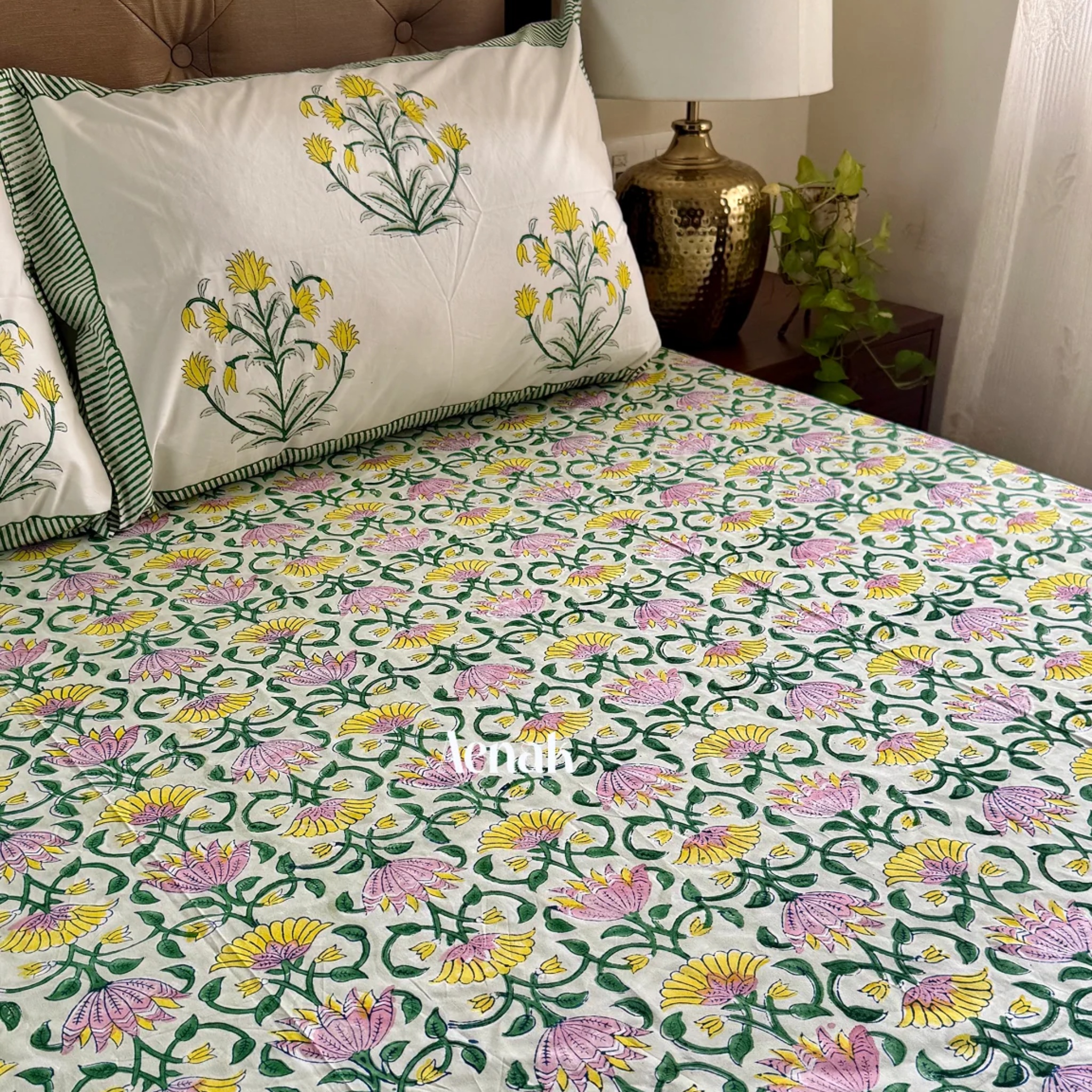 Pink & Yellow Lotus Handblock Bedsheet + Quilted Bedcover Combo Set by Aenak Studios | Tooffi