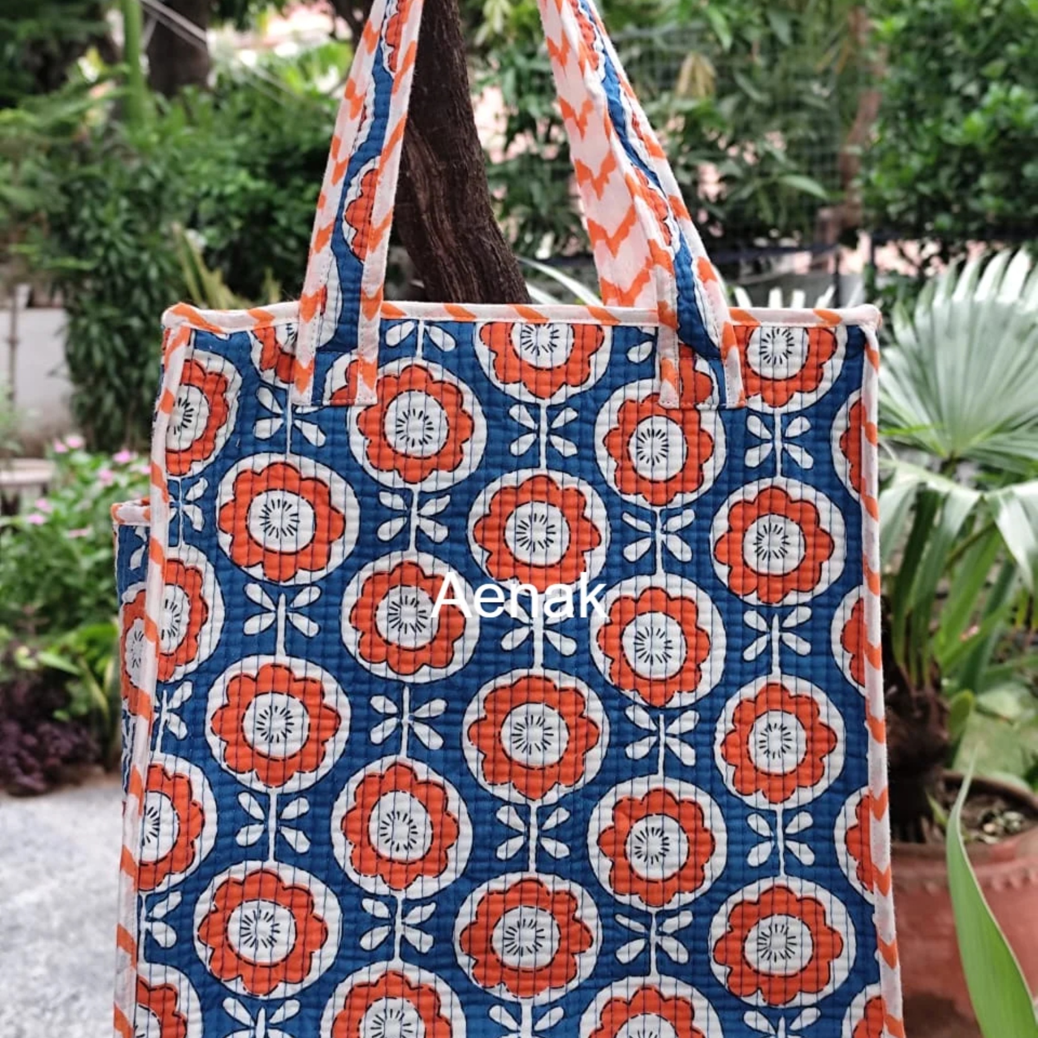 Orange Floral Handblock Lunch Bag by Aenak Studios | Tooffi